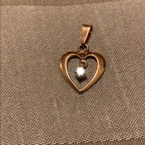 Gold and diamond pendant